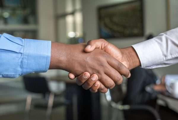 shaking hands marketing and hiring kindred marketing muskegon